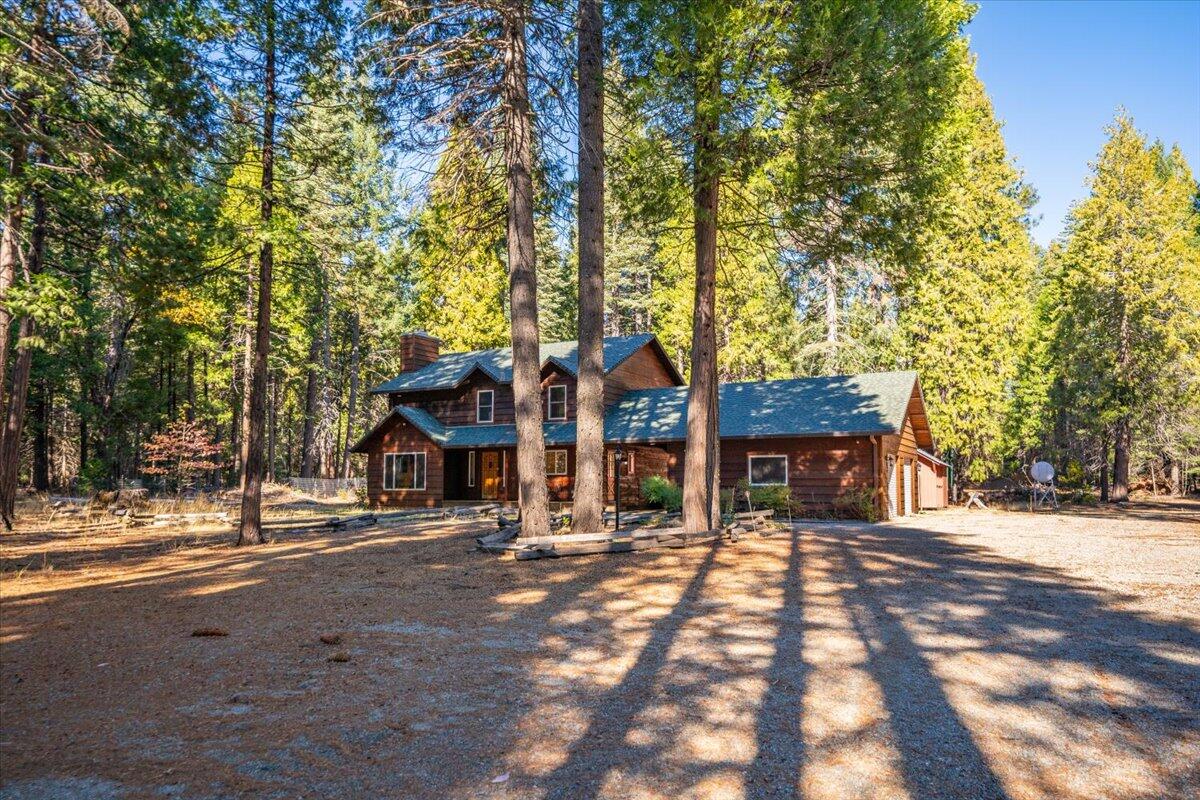 34820 Emigrant Trail Shingletown, CA 96088 - Photo 42 of 42 a front view of a house with a tree