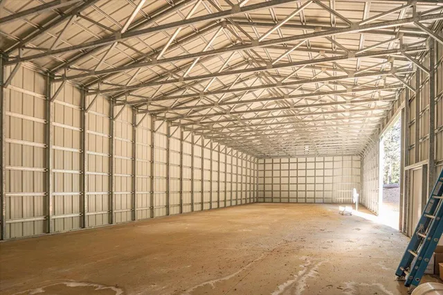 a view of a room with windows