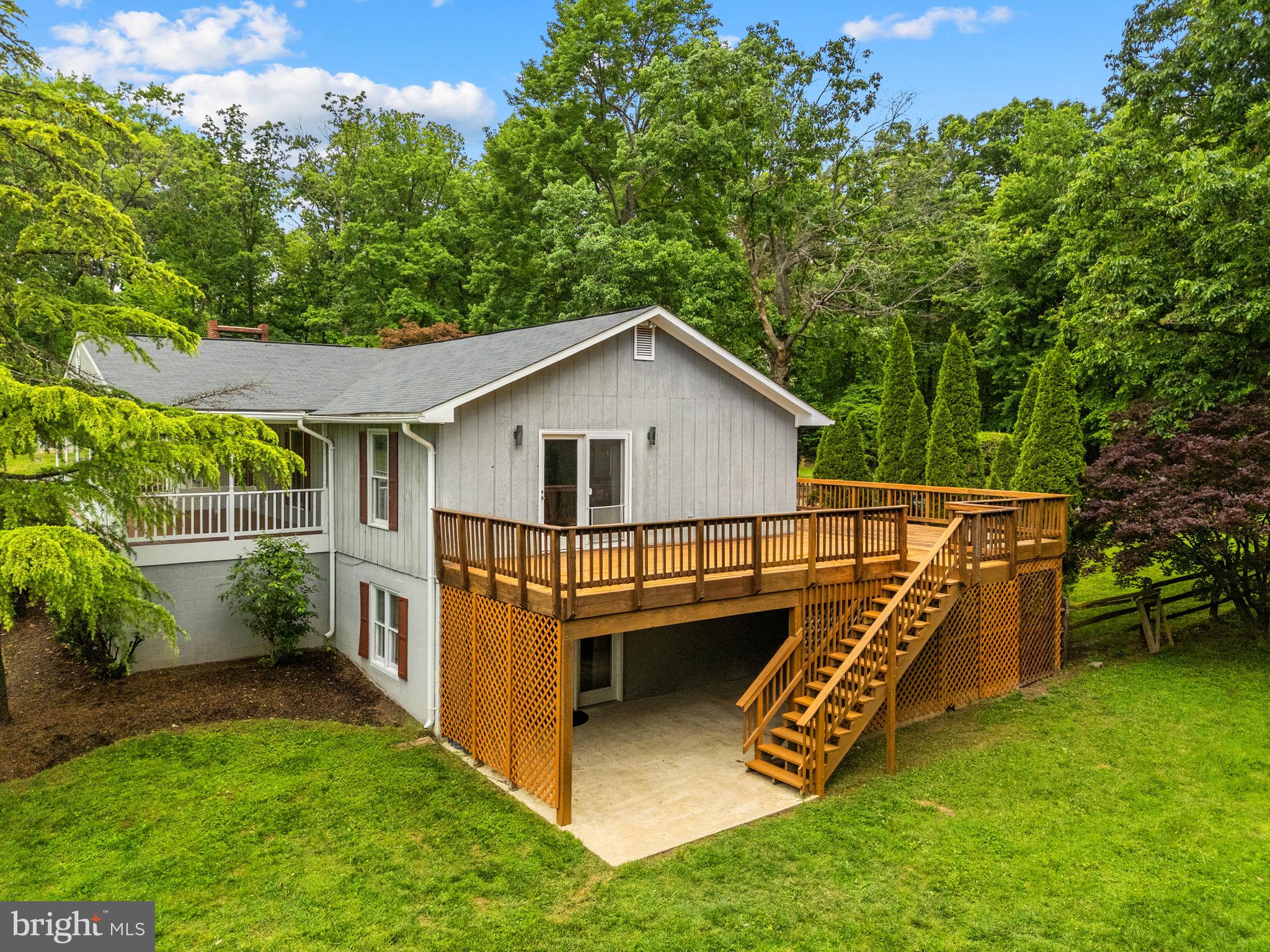 41726 Stumptown Road Leesburg, VA 20176 - Photo 69 of 91 Side View with Wraparound Deck and Stairs to Yard