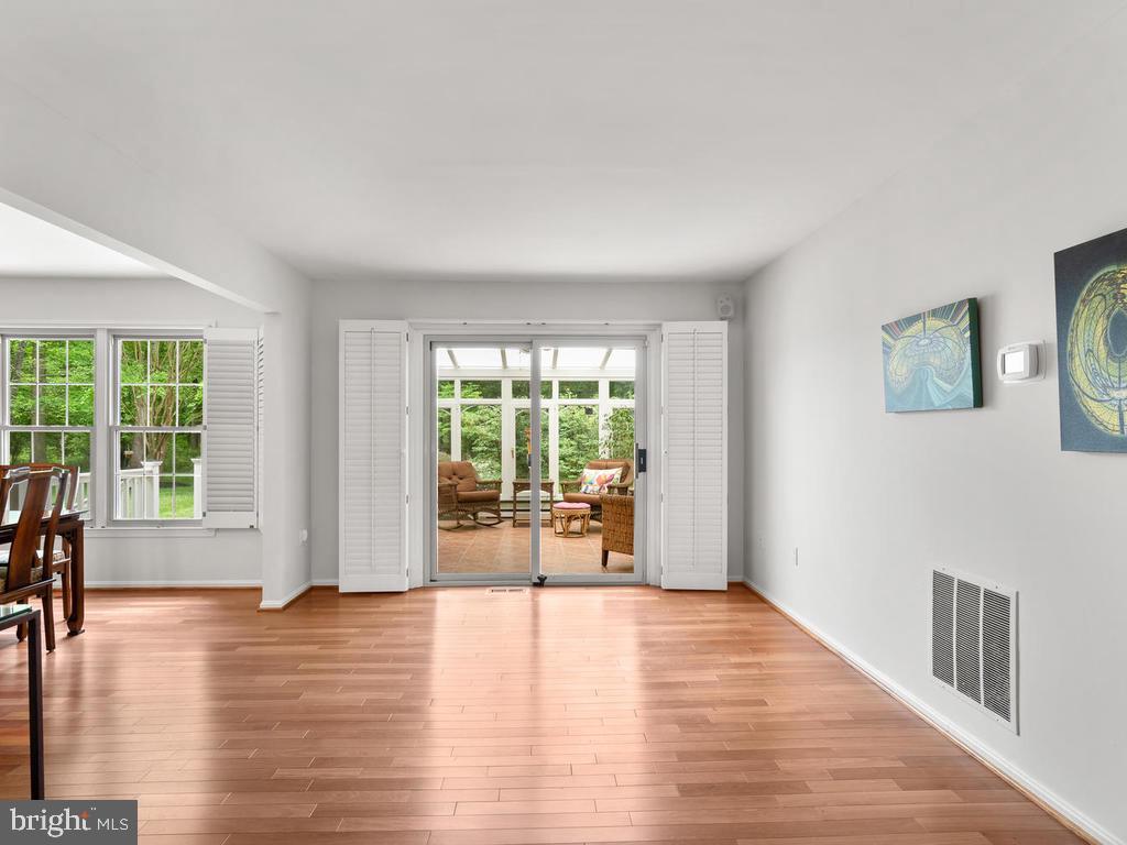 600 Bryants Nursery Road Silver Spring, MD 20905 - Photo 10 of 60 View through living room to sunroom
