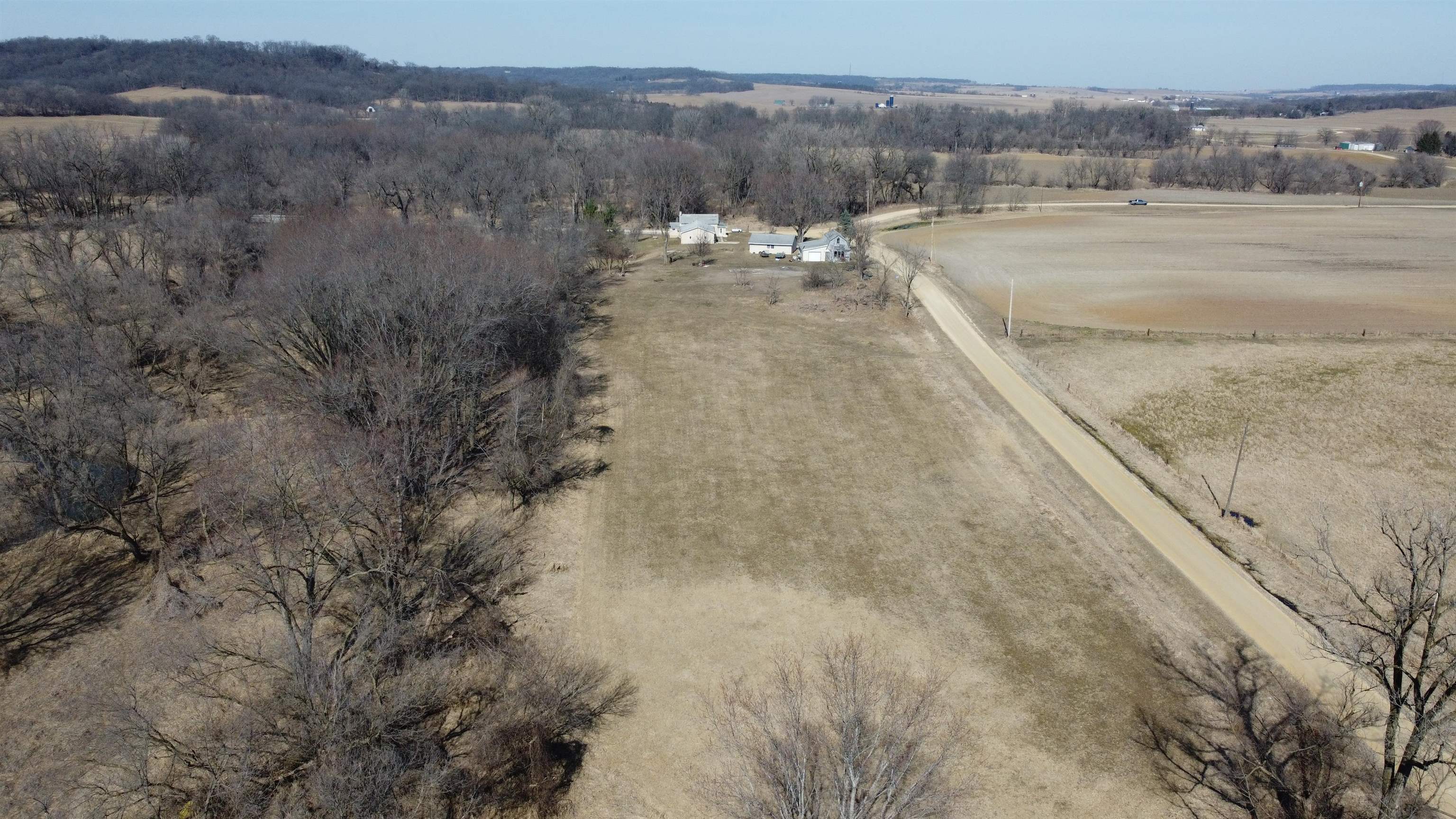 9406 South Rush Road Hanover, IL 61041 - Photo 11 of 15 a view of a dry yard with trees
