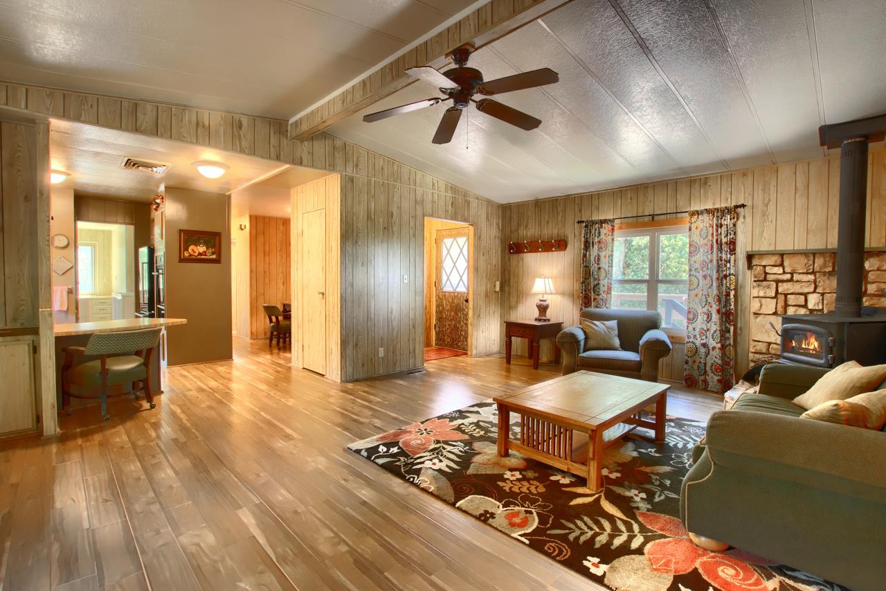 2843 East Westfall Road Mariposa, CA 95338 - Photo 14 of 45 a living room with furniture and a wooden floor