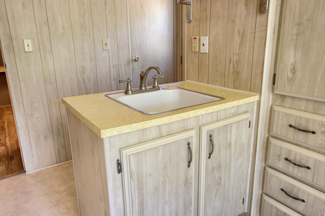 2843 East Westfall Road Mariposa, CA 95338 - Photo 24 of 45 a bathroom with a sink and a mirror