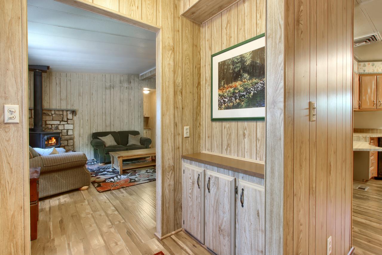 2843 East Westfall Road Mariposa, CA 95338 - Photo 10 of 45 a view of a livingroom with furniture and a flat screen tv