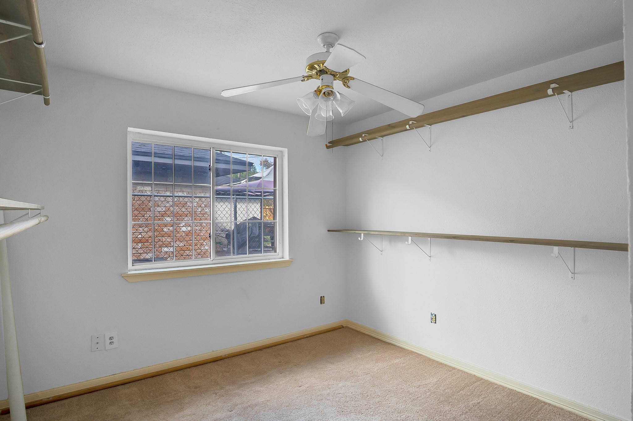 10939 Dunvegan Way Houston, TX 77029 - Photo 23 of 28 a view of an empty room with a window