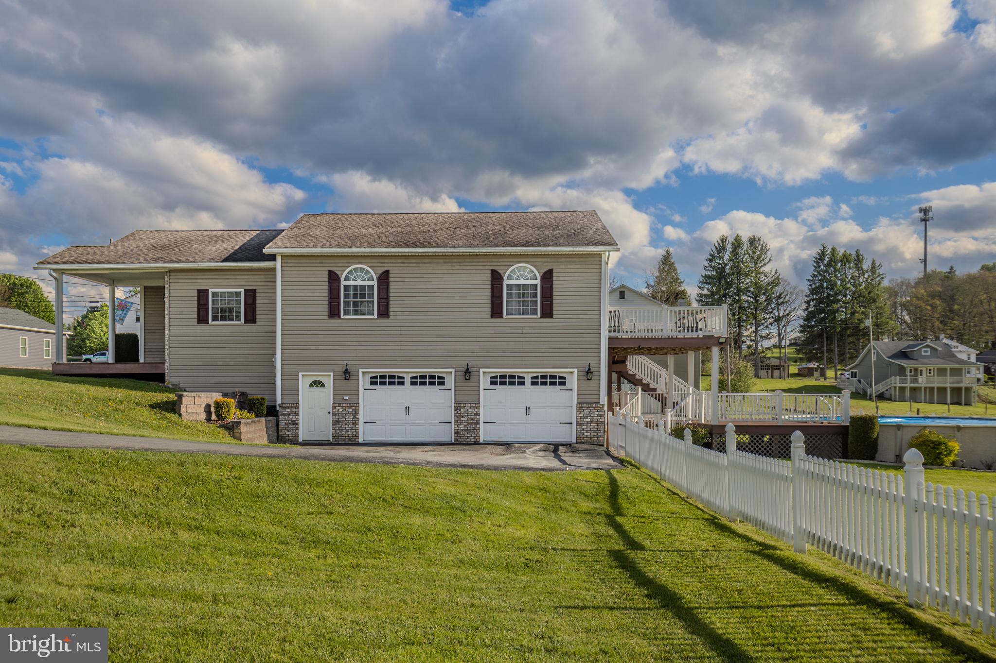 18 Springs Road Grantsville, MD 21536 - Photo 102 of 106 a house view with swimming pool and trees in the background