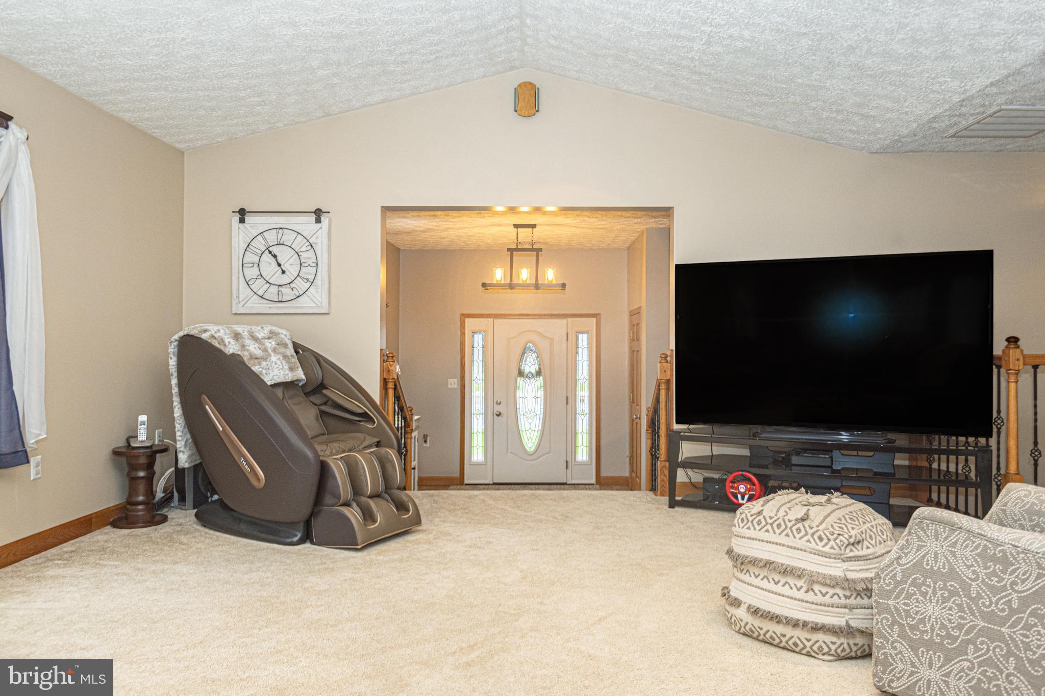 18 Springs Road Grantsville, MD 21536 - Photo 18 of 106 a living room with furniture and a flat screen tv