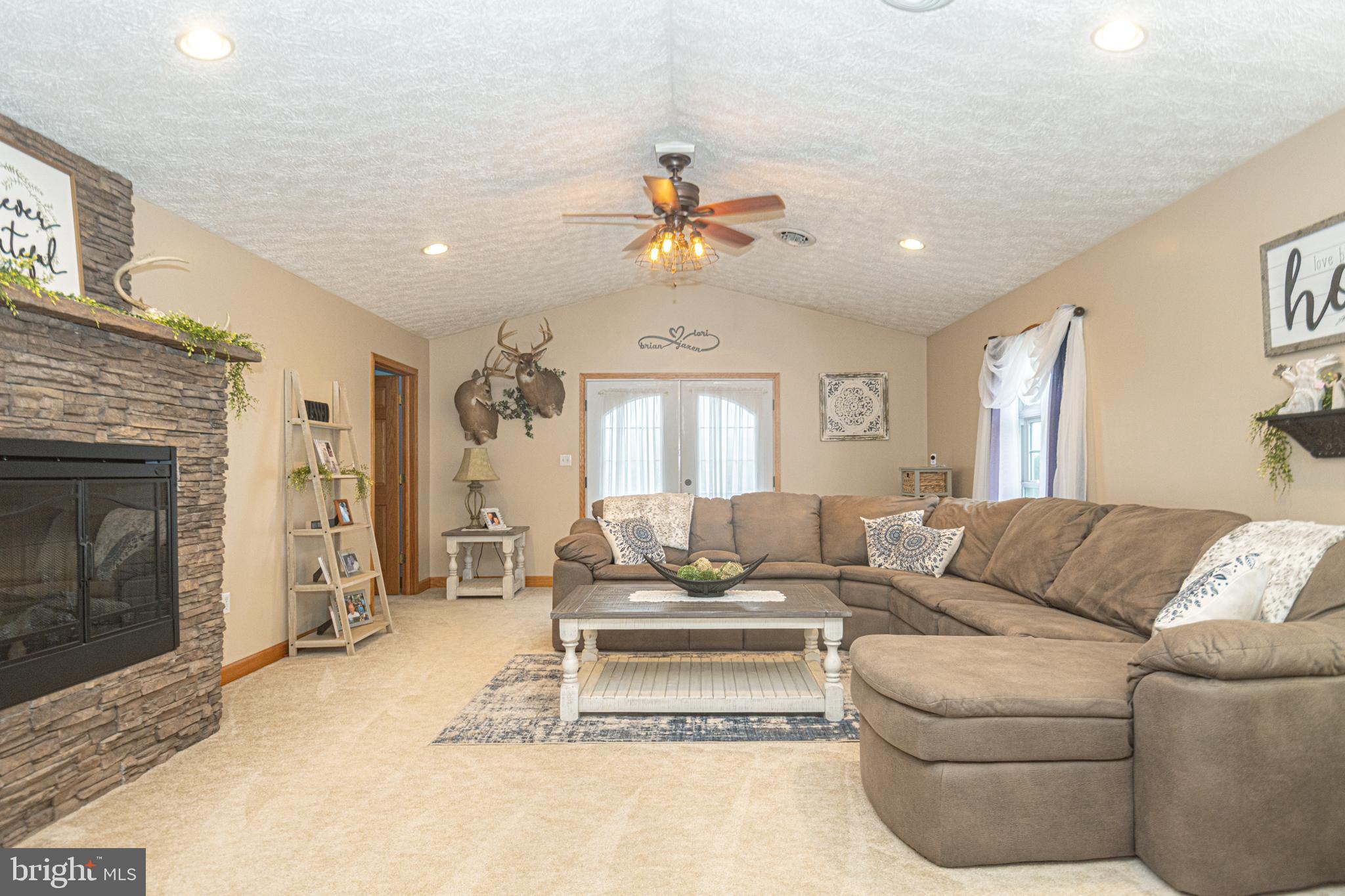 18 Springs Road Grantsville, MD 21536 - Photo 27 of 106 a living room with furniture and a fireplace