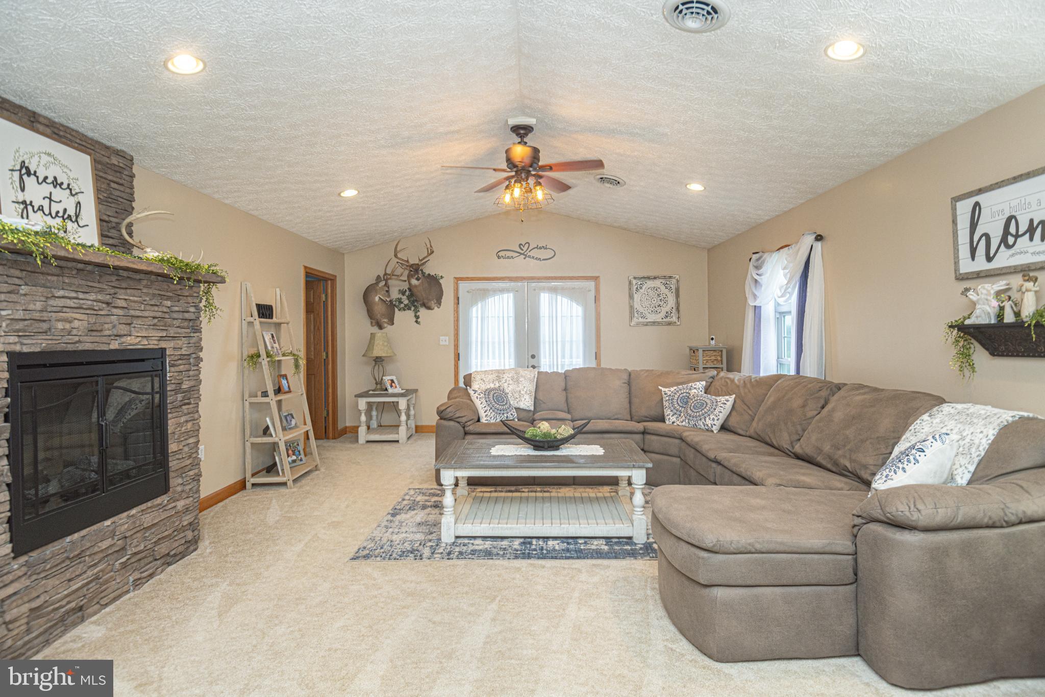 18 Springs Road Grantsville, MD 21536 - Photo 28 of 106 a living room with furniture and a fireplace