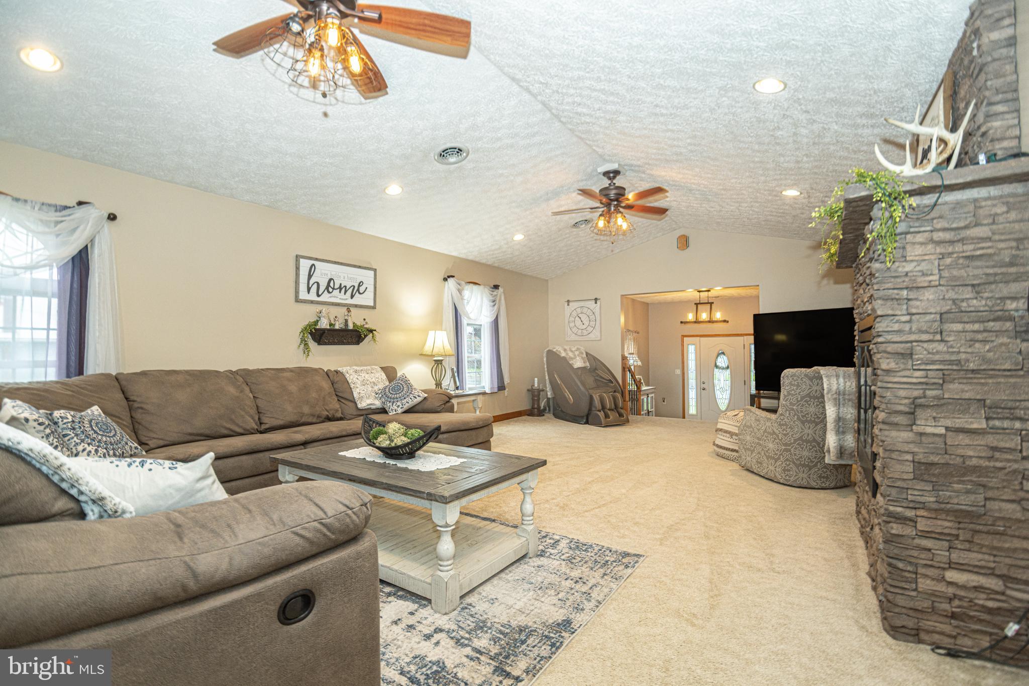 18 Springs Road Grantsville, MD 21536 - Photo 50 of 106 a living room with furniture and a fireplace