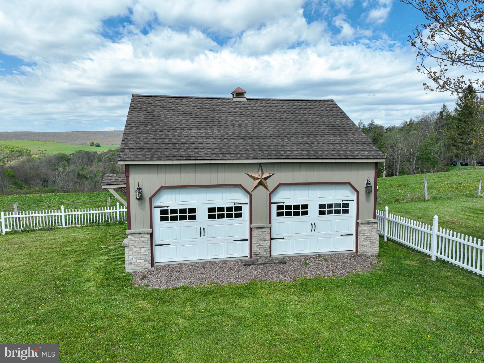 18 Springs Road Grantsville, MD 21536 - Photo 7 of 106 a view of a house with a yard and a garden