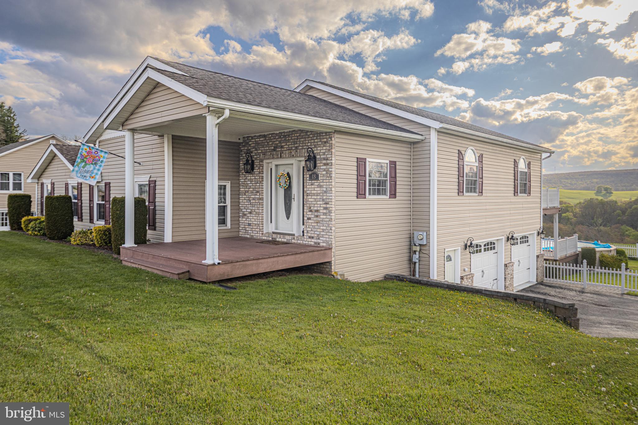 18 Springs Road Grantsville, MD 21536 - Photo 82 of 106 a view of a house with a chairs in a patio