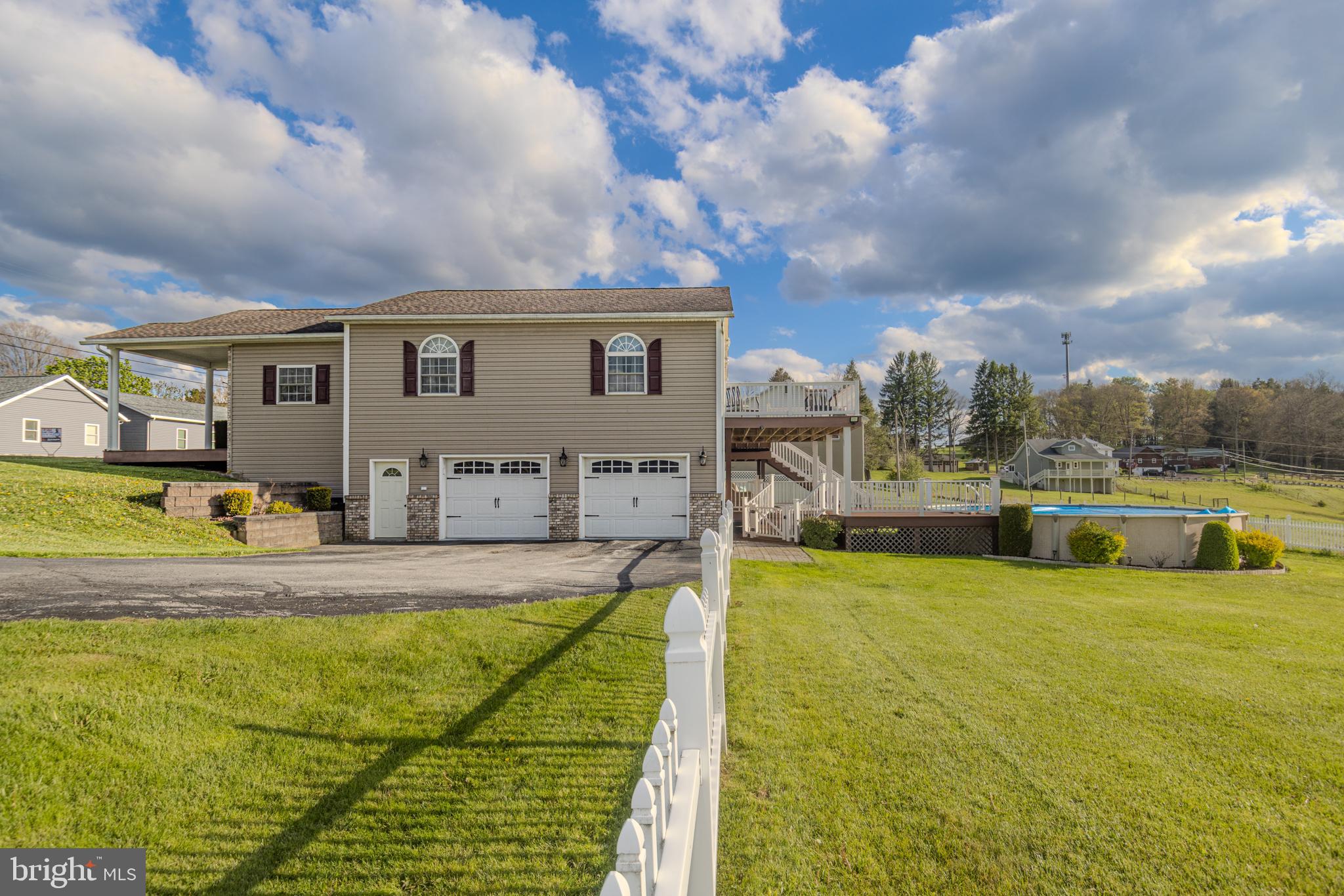 18 Springs Road Grantsville, MD 21536 - Photo 86 of 106 a view of a house with swimming pool and sitting area