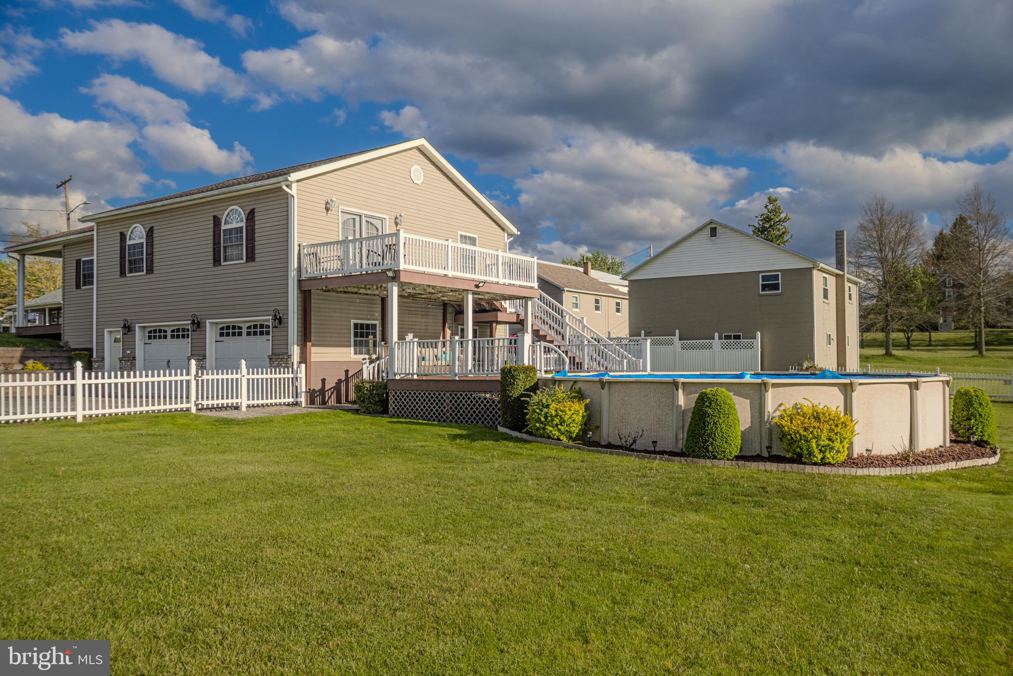 18 Springs Road Grantsville, MD 21536 - Photo 98 of 106 a view of a house with a swimming pool and a yard