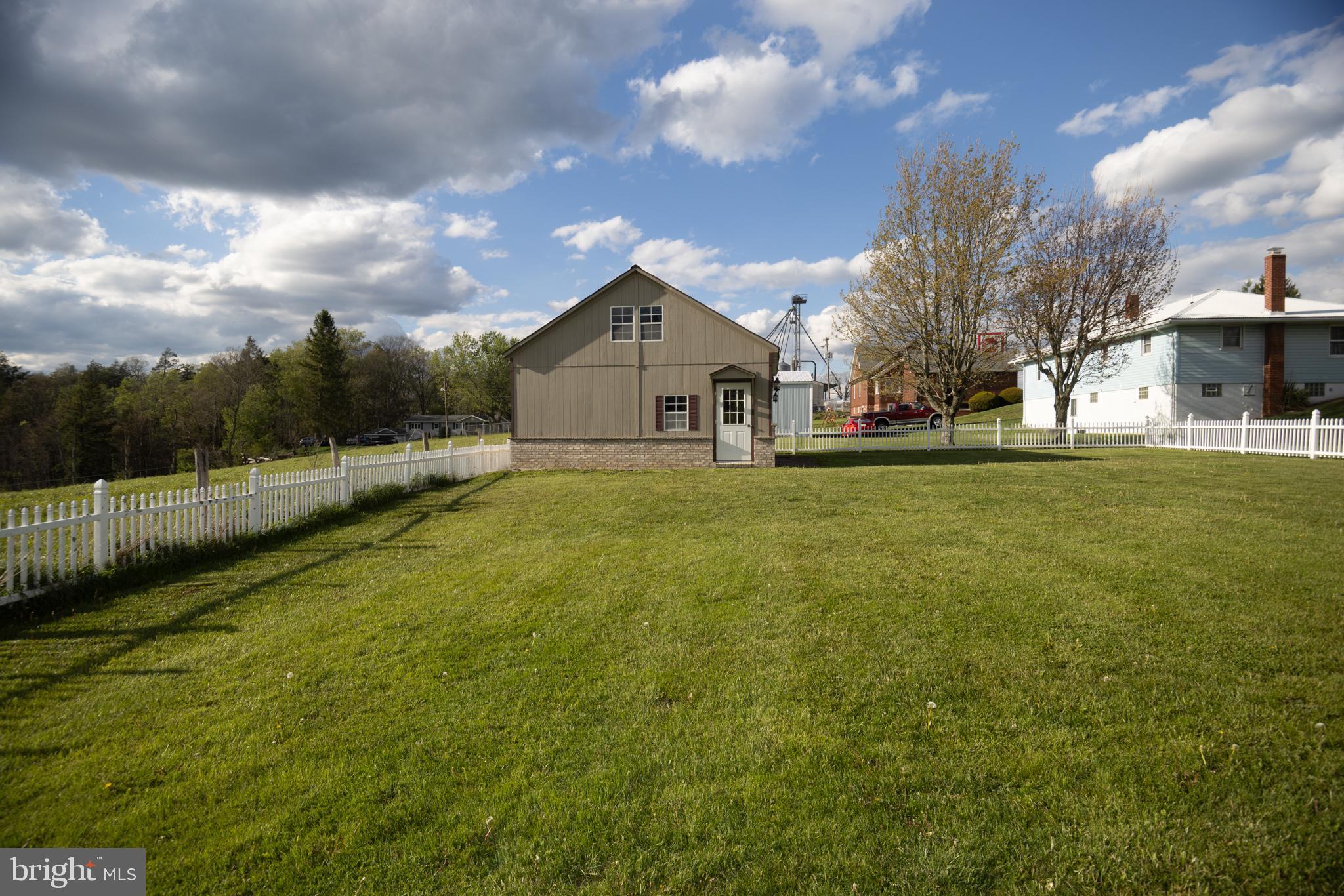 18 Springs Road Grantsville, MD 21536 - Photo 100 of 106 a view of a house with a big yard and a large tree