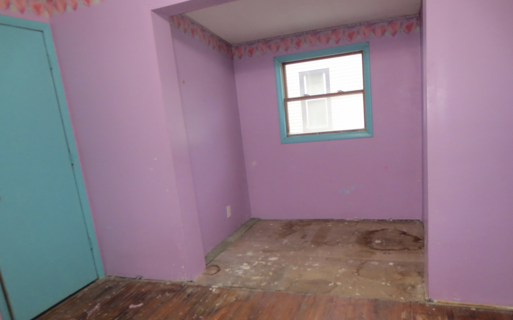 311 North 4th Street Oregon, IL 61061 - Photo 3 of 6 a view of a small space with a window