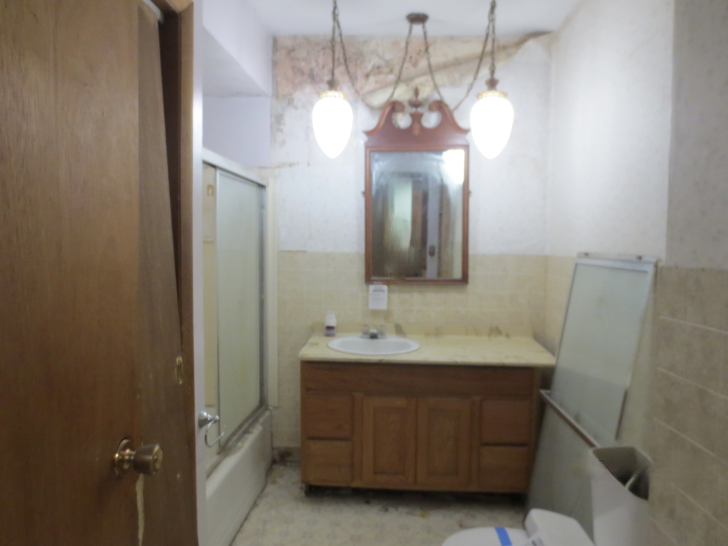 311 North 4th Street Oregon, IL 61061 - Photo 5 of 6 a bathroom with a sink and a mirror