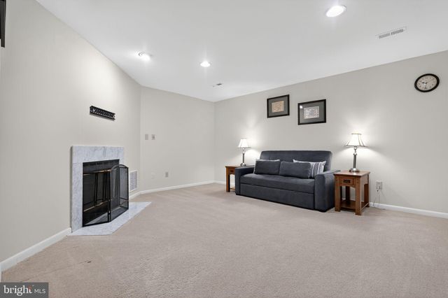 a view of livingroom with furniture and fireplace