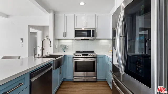 a view of a swimming pool with a patio and a yard