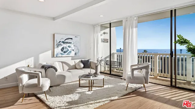 a kitchen with kitchen island a sink stove and refrigerator