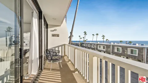 a kitchen with stainless steel appliances granite countertop a stove a refrigerator and a sink