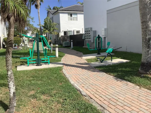 a view of a park with a slide