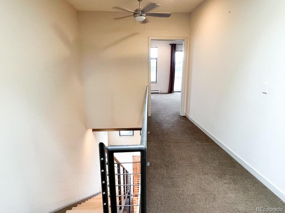 11570 Colony Row Broomfield, CO 80021 - Photo 20 of 24 a view of a hallway with a elevator
