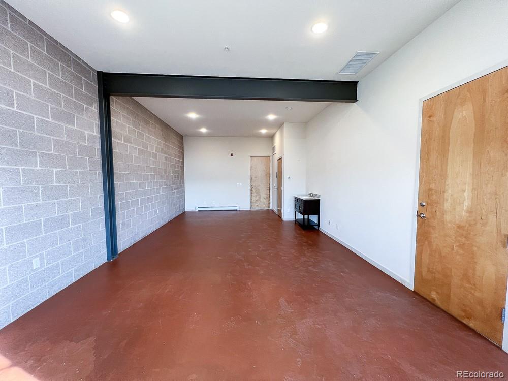 11570 Colony Row Broomfield, CO 80021 - Photo 3 of 24 a view of an empty room with a window