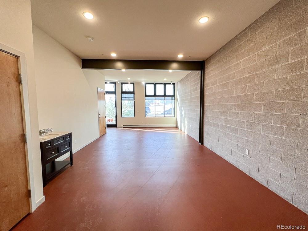 11570 Colony Row Broomfield, CO 80021 - Photo 6 of 24 a view of an empty room with a window