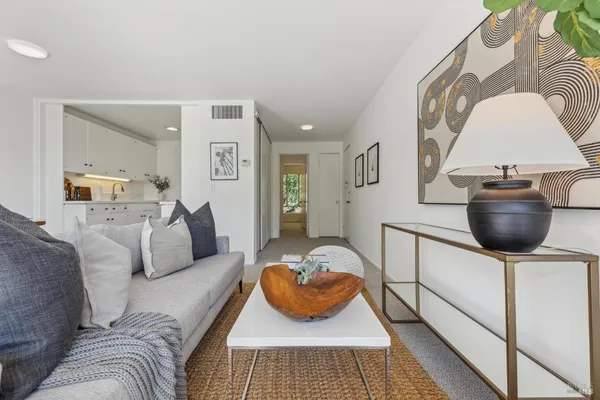 a living room with furniture and a couch