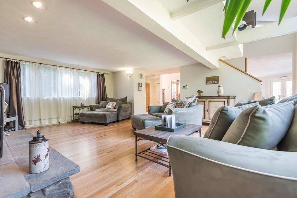 351 Main Street Boxford, MA 01921 - Photo 11 of 30 a living room with furniture or couch and a large window