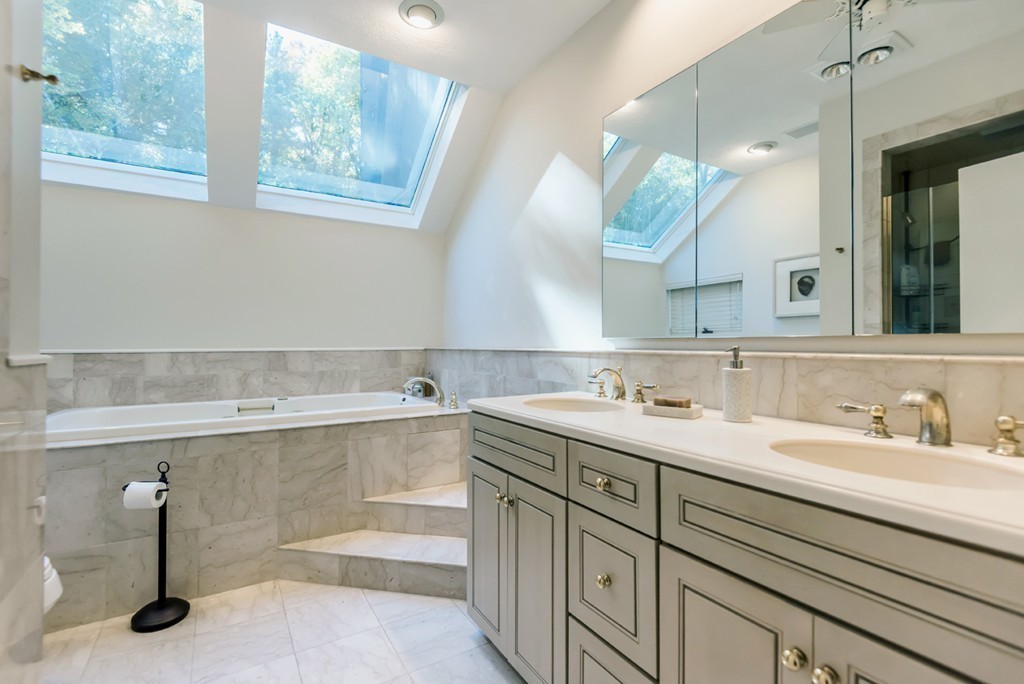 351 Main Street Boxford, MA 01921 - Photo 16 of 30 a bathroom with a sink and a mirror