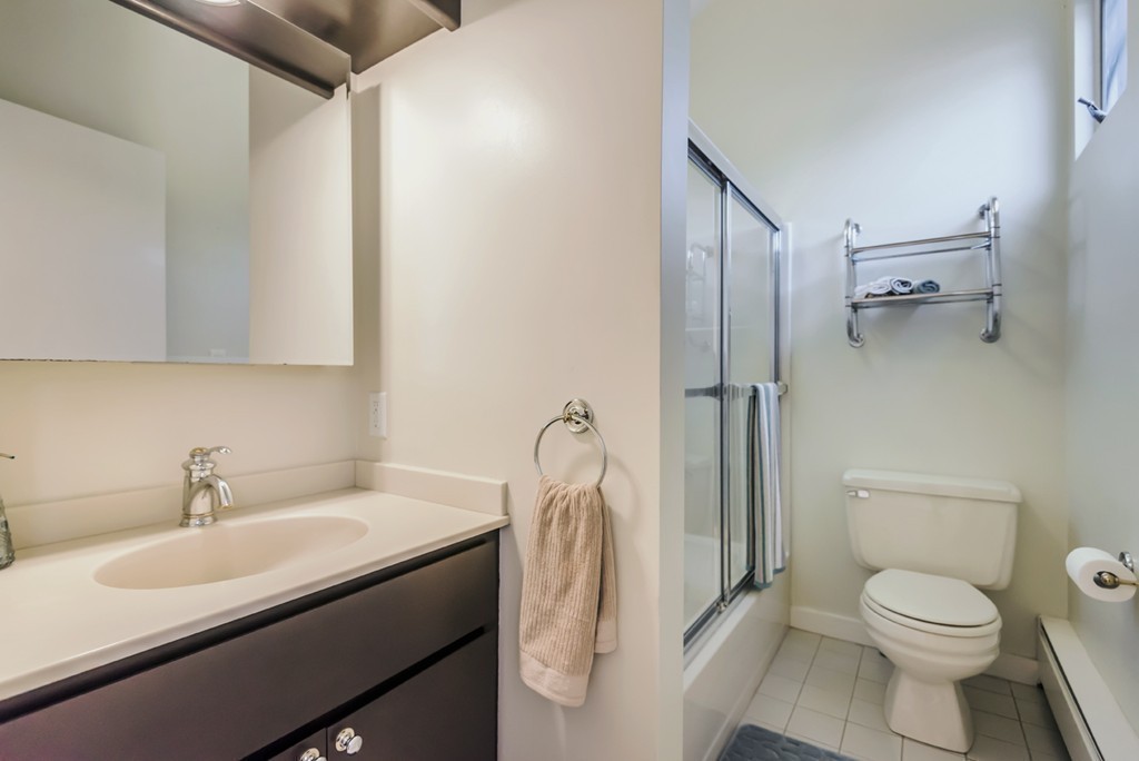 351 Main Street Boxford, MA 01921 - Photo 20 of 30 a bathroom with a sink toilet and shower
