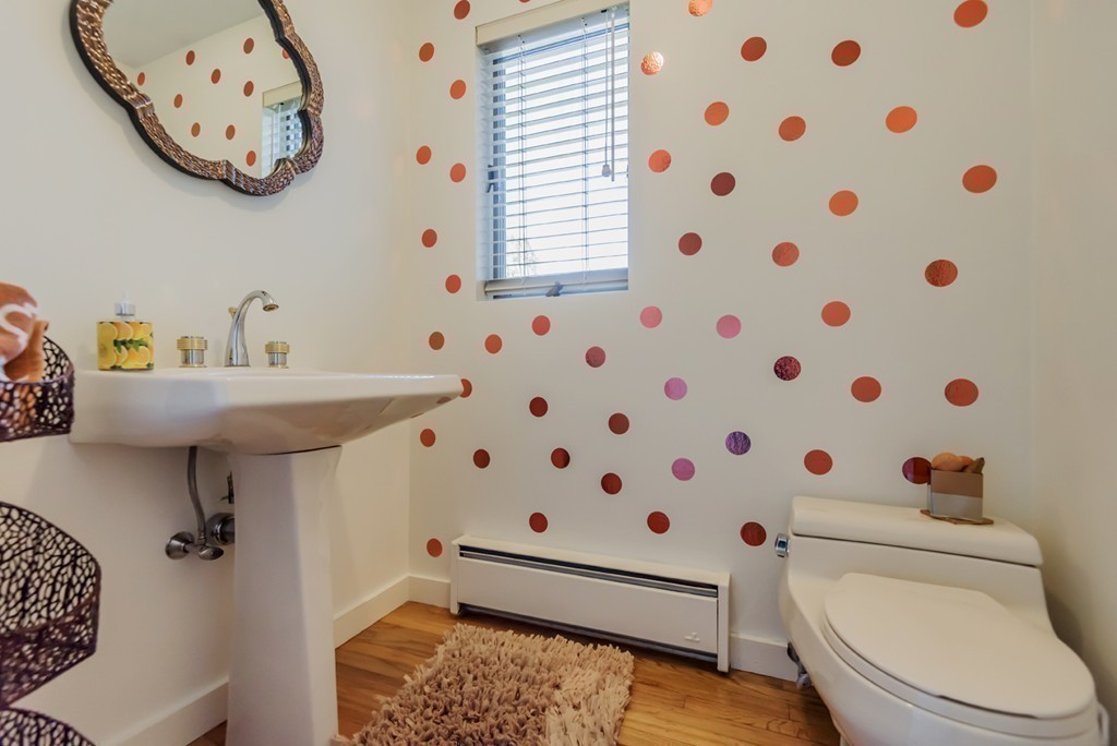 351 Main Street Boxford, MA 01921 - Photo 25 of 30 a bathroom with a sink toilet and shower