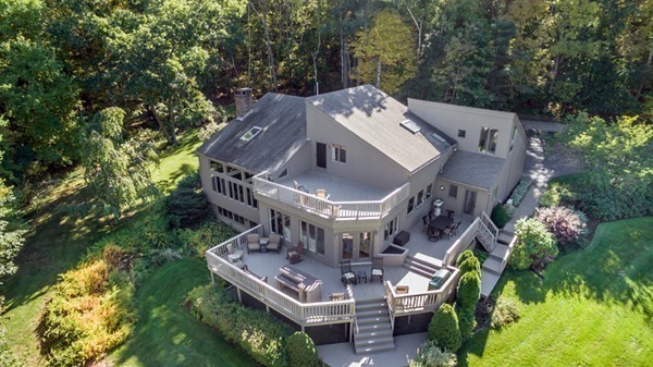 351 Main Street Boxford, MA 01921 - Photo 27 of 30 an aerial view of a house with a big yard and potted plants