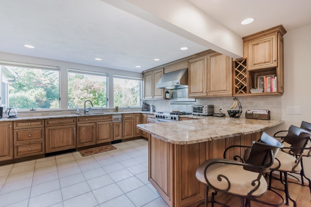 351 Main Street Boxford, MA 01921 - Photo 3 of 30 a kitchen with sink cabinets and window