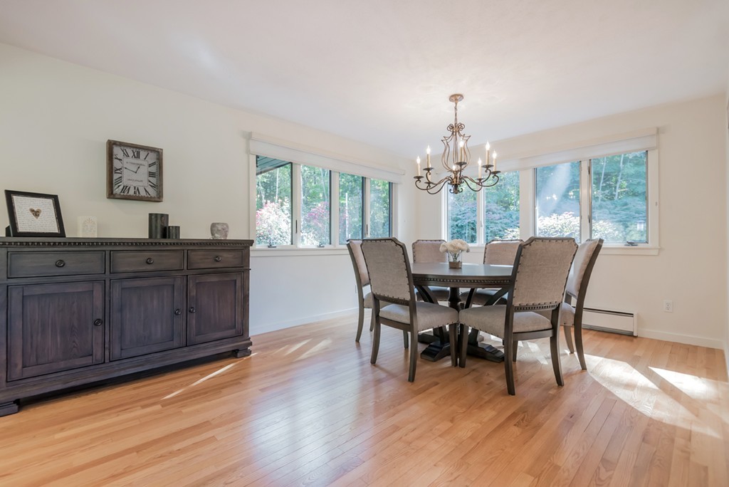351 Main Street Boxford, MA 01921 - Photo 5 of 30 a view of a dining room with furniture window and wooden floor