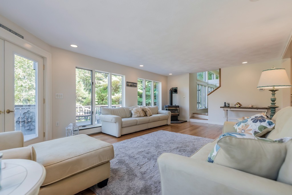 351 Main Street Boxford, MA 01921 - Photo 8 of 30 a living room with furniture and a large window