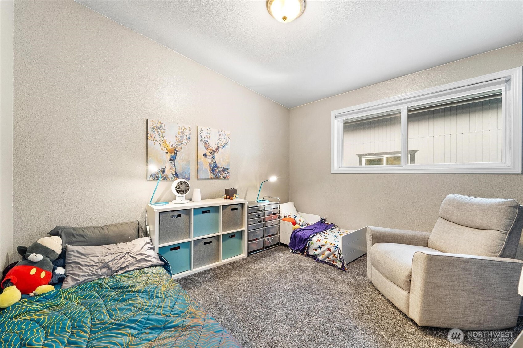 18308 Southeast 145th Street Renton, WA 98059 - Photo 13 of 26 a bedroom with furniture and a window