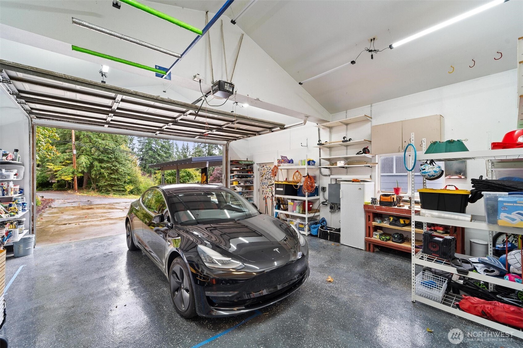 18308 Southeast 145th Street Renton, WA 98059 - Photo 19 of 26 a car parked in a garage
