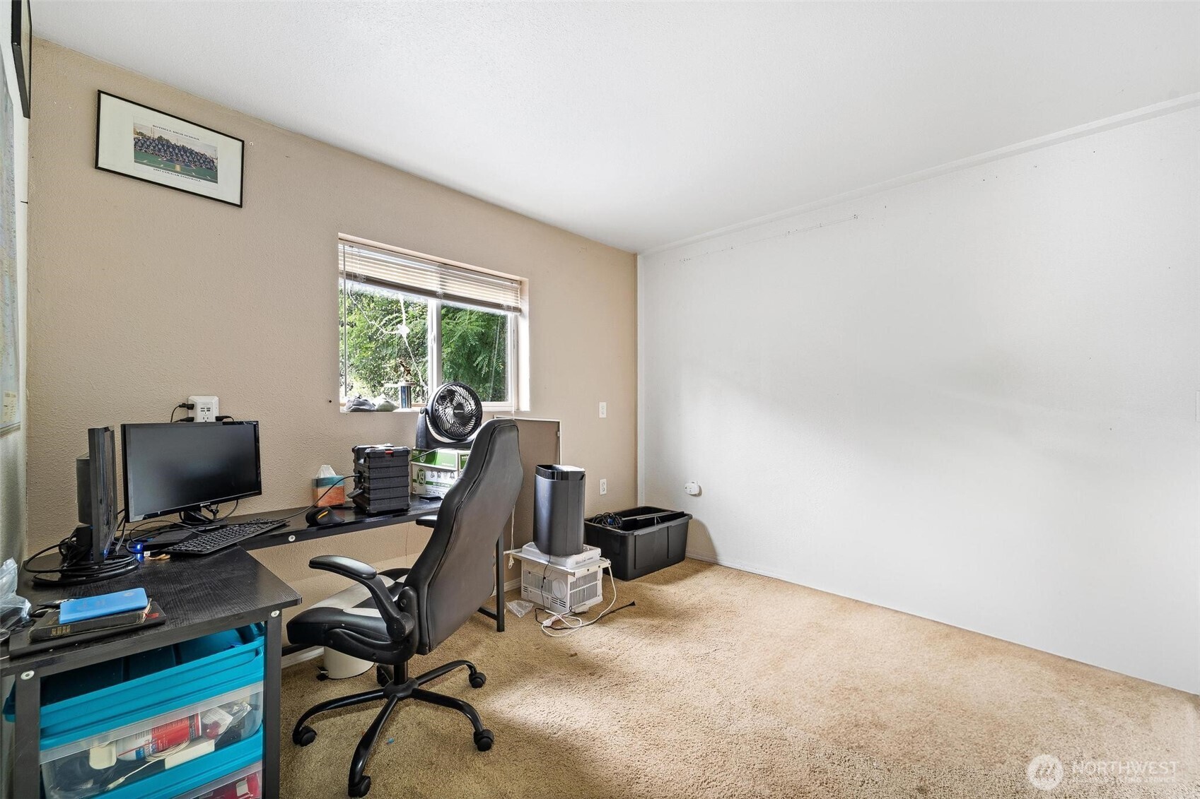 18308 Southeast 145th Street Renton, WA 98059 - Photo 20 of 26 a view of a workspace with furniture and a window