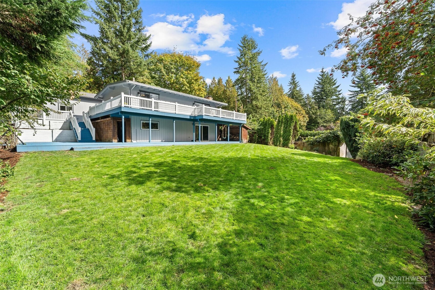 18308 Southeast 145th Street Renton, WA 98059 - Photo 21 of 26 a house view with a garden space