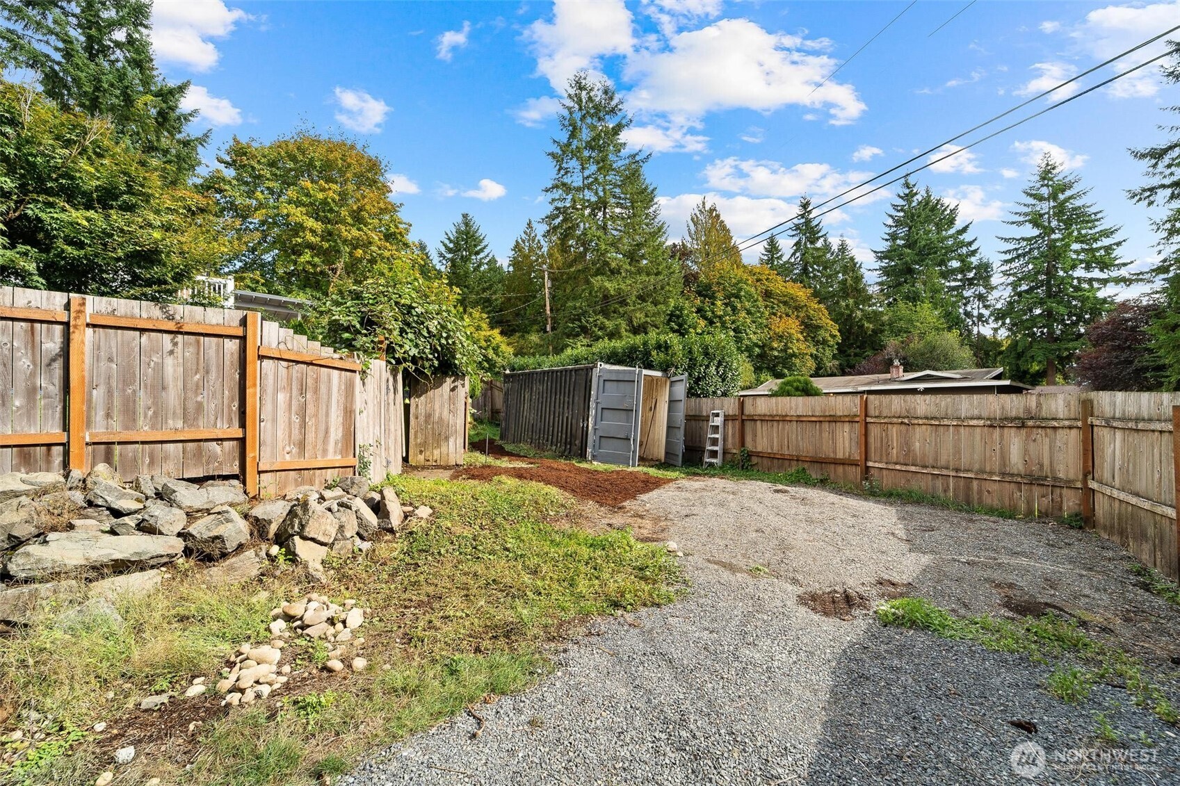 18308 Southeast 145th Street Renton, WA 98059 - Photo 23 of 26 a backyard of a house with lots of green space