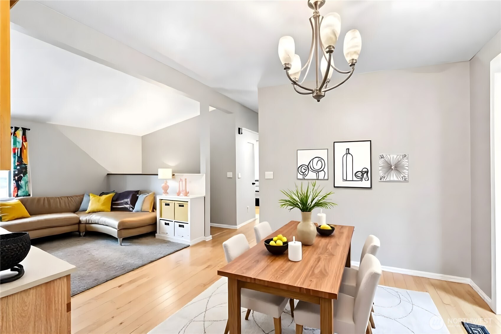 18308 Southeast 145th Street Renton, WA 98059 - Photo 5 of 26 a living room with furniture a chandelier and a table