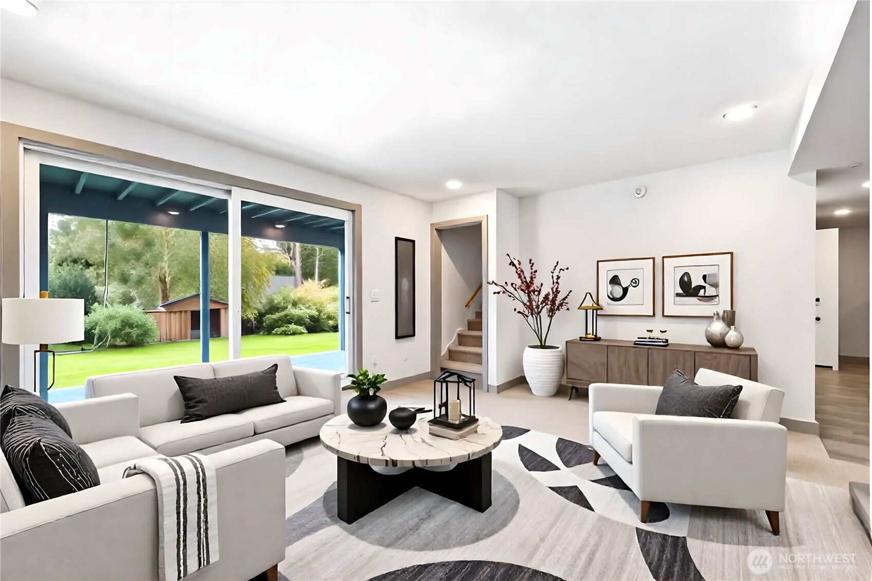 18308 Southeast 145th Street Renton, WA 98059 - Photo 10 of 26 a living room with furniture and a large window