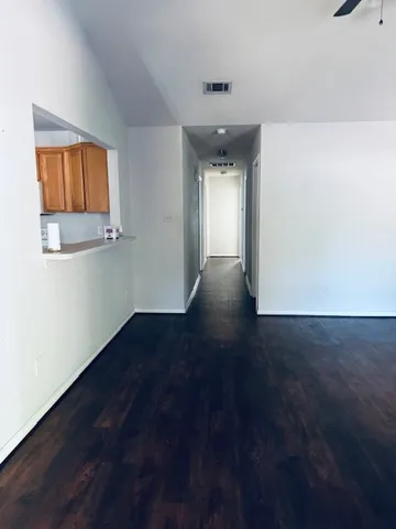 a view of a room with an empty space