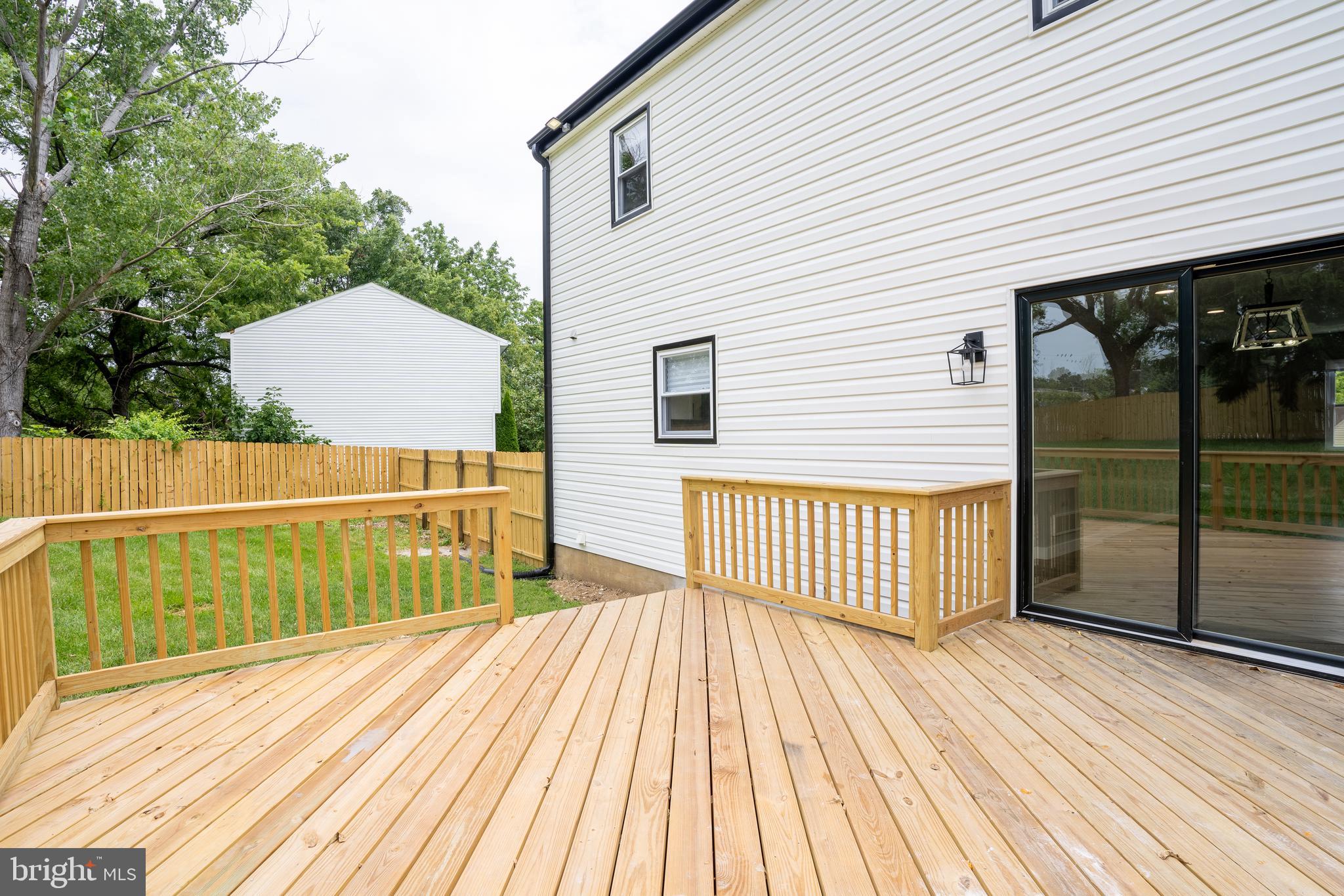 7010 Glen Spring Road Windsor Mill, MD 21244 - Photo 18 of 47 Expansive Rear Deck and Fully-Fenced Yard