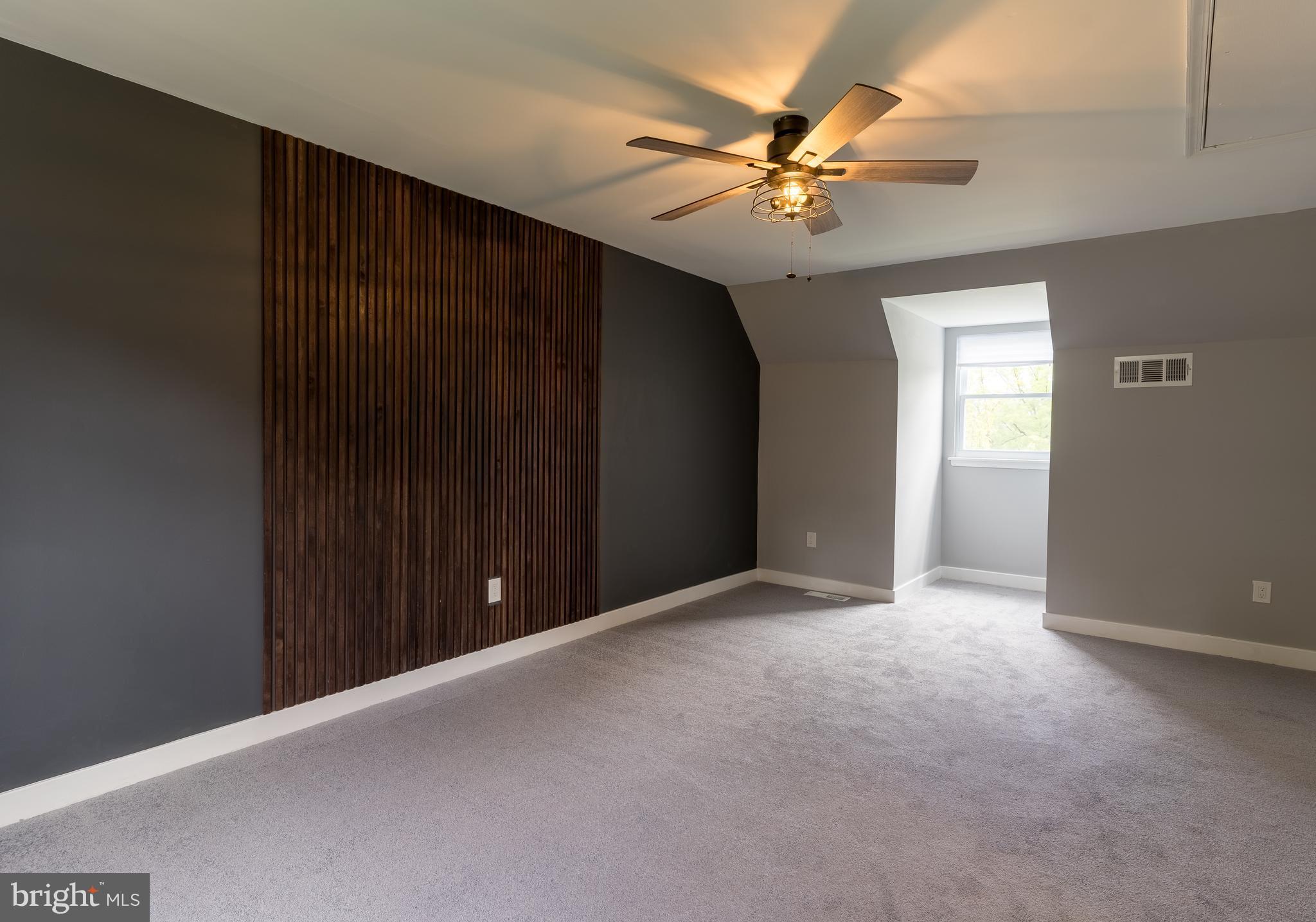 7010 Glen Spring Road Windsor Mill, MD 21244 - Photo 28 of 47 Owner's Suite w/ Custom Wooden Slat Wall