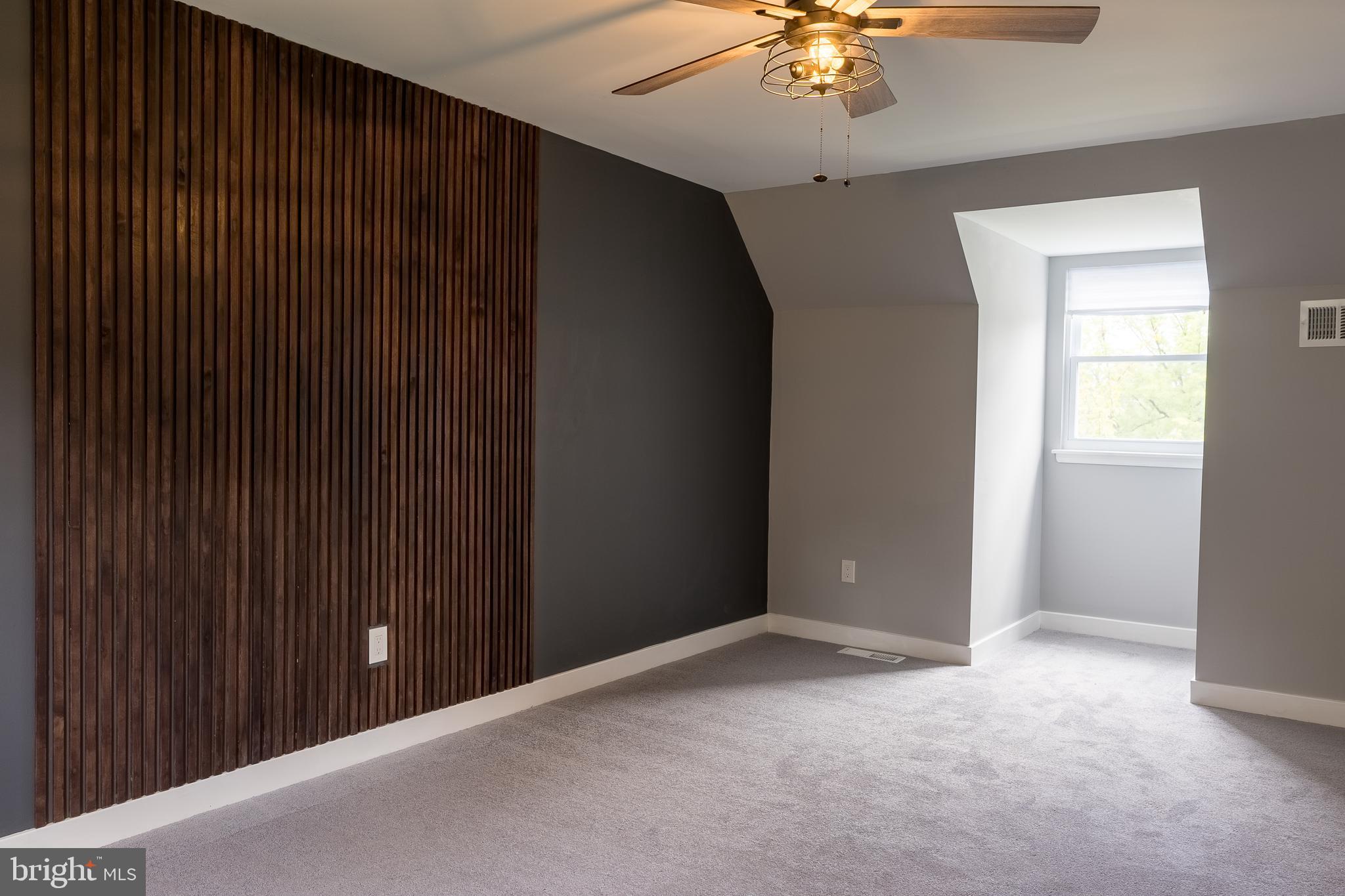 7010 Glen Spring Road Windsor Mill, MD 21244 - Photo 29 of 47 Owner's Suite w/ Custom Wooden Slat Wall