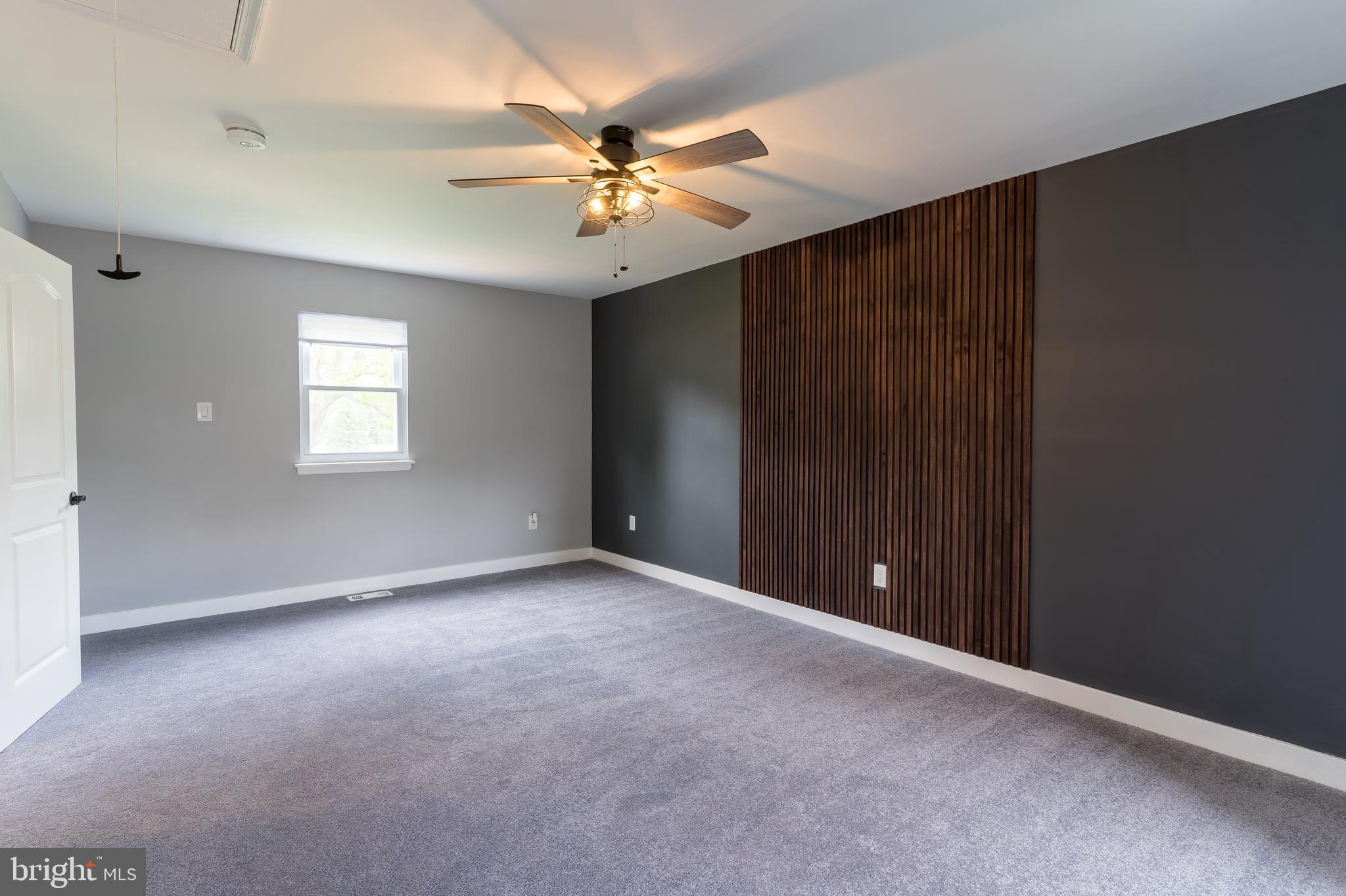 7010 Glen Spring Road Windsor Mill, MD 21244 - Photo 31 of 47 Owner's Suite w/ Custom Wooden Slat Wall